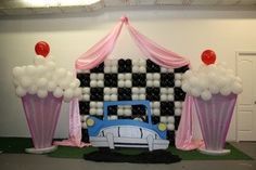 this is an image of a car themed birthday party setup for a child's birthday