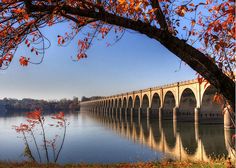 an old bridge over a large body of water