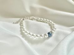 This would be a perfect gift for a bride! Something blue for bride bracelet or anklet with extender something blue bride gift wedding gift something blue initial wedding bracelet ------ This is not a cheap plastic pearl bracelet, it's a quality glass pearl bracelet. I make each peace of jewelry by myself and I would be happy to make any changes you want. Just write me a message! ------ These are average lengths of bracelets: newborn to 6 month -- 4" - 4,5" 6 month to 24 month -- 4.5" - 5" 2 to 4 White Pearl Bracelet With Extender For Wedding, White Pearl Wedding Bracelet With Extender, Adjustable Blue Pearl Bracelet For Wedding, Dainty Blue Bracelets For Wedding, Wedding Anklets Brides, Bride Something Blue, Wedding Something Blue, Something Blue For Bride, Bride Bracelet