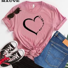 a pink t - shirt with the words i love you and a heart on it