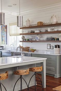 the kitchen is clean and ready to be used for cooking or baking, with lots of counter space