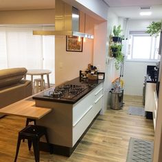 the kitchen is clean and ready to be used as a living room or dining area