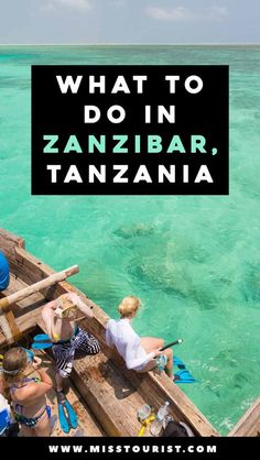 people on a boat in the ocean with text overlay that reads what to do in zanzar, tanzania