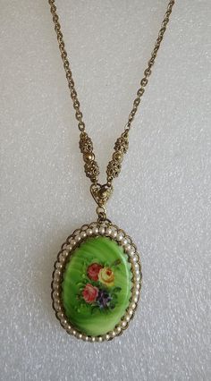 Antique Pendant Necklace, Vintage Glass Jewelry For Parties, Retro Long Necklace As Gift, Retro Formal Necklace With Vintage Charm, Formal Retro Necklace With Vintage Charm, Vintage Long Glass Necklace, Retro Glass Necklace For Gifts, Antique Glass Necklaces For Collectors, Vintage Cameo Metal Jewelry