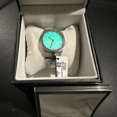 Gucci 25h 38mm Watch 100 Percent Authentic Brand New Gucci 25h Watch, Classic Gucci Watch Accessories With Diamond Hour Markers, Modern Gucci Chronograph Watch, Modern Gucci Watch Accessories With Metal Dial, Modern Gucci Analog Watch, Modern Gucci Watches, Designer Blue Watch, Modern Gucci Watch For Gift, Designer Blue Watch For Gift