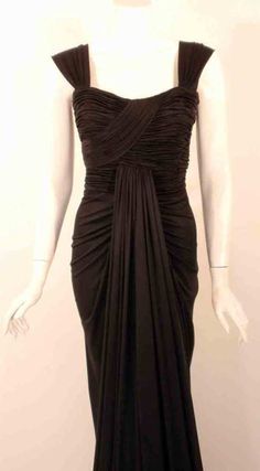 For Sale on 1stDibs - This is a gorgeous black silk jersey 'Uta' gown, by Elizabeth Mason Couture. The 'Uta' gown highlights her signature drape design which contours the curves Designer Drapes, Historical Fashion, Black Silk, Halter Formal Dress, Fashion Photographer, Timeless Fashion, Cocktail Dress, Highlights, Formal Dresses