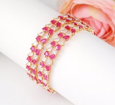 Luxurious Look diamond Ruby stone studded high quality gold plated bangles at an unimaginable price! Available in 2.8 Size Gold Bangle Designs, Gold Plated Bangles, Gold Bangles Design, Bangles Style, Ruby Stone, Bangle Designs, Stone Studs, Gold Bangle, Stone Gold