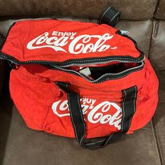 Nwot Coca Cola Duffel Bag Red Tote Duffle Bag For Everyday Use, Red Large Capacity Satchel Duffle Bag, Red Functional Bag With Luggage Sleeve, Red Duffle Bag Tote For Everyday Use, Retro Red Travel Bags, Red School Bag With Luggage Sleeve, Red Bag With Luggage Sleeve For Daily Use, Casual Red Duffle Bag For Everyday, Casual Red Travel Bag For Daily Use