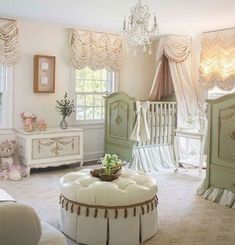 a baby's room with white furniture and curtains