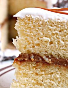 two pieces of cake sitting on top of a white plate