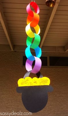 a multicolored sculpture hanging from the ceiling