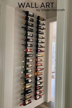 a wall mounted wine rack filled with lots of bottles