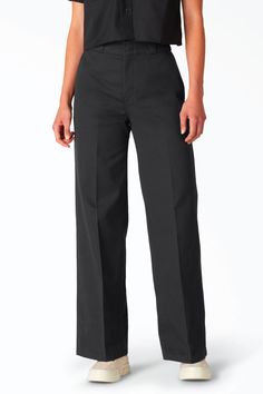 The Wide Leg Work Pants are rooted in workwear styling from the Dickies archives and updated with a modern wide leg silhouette. These twill pants have a stonewash for a softer hand feel and the contoured waistband ensures a flattering fit. Women's twill pants Relaxed fit Soft twill fabric High rise Wide leg Slant hand pockets Contoured waist Rear pockets Hook & eye closure 65% polyester, 35% cotton Model wearing a size 4 Size Guide: 2 = waist 27", hips 35" 4 = waist 27.5", hips 36.5" 6 = waist 2 Wide Leg Work Pants, Work Pants Women, Dickies Pants, Leg Work, Work Shirts, Work Outfit