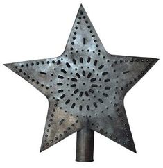 a metal star with holes on it