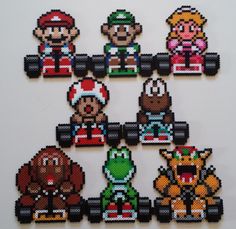 the pixelated mario bros characters are arranged in rows