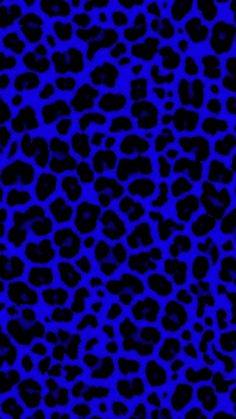 a blue and black animal print background with spots on the skin, which is very dark