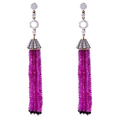 A beautiful work of art with Plain Ruby Beads Tassels with Diamonds and Onyx. There are 78.74 cts. of Ruby, 1.64 cts of Onyx, and 1.88 cts of Diamonds The earrings weigh 28.29 grams. Luxury Ruby Latkans Earrings, Beads Tassels, Beaded Tassel Earrings, Ruby Beads, Egyptian Jewelry, Beaded Tassels, Dream Jewelry, Tassel Earrings, Chandelier Earrings