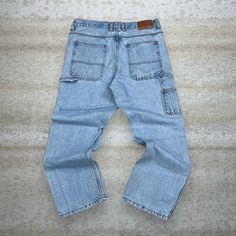 "Vintage Schmidt Carpenter Jeans Light Wash Work Wear Denim Baggy Wide Leg Fit 90s Skate / Streetwear Great Condition: 7/10 (small marks like shown , aka some character) Men's Size:  Waist: 34\" Length (inseam): 30\" Leg Opening: 8.5\" Thigh Opening: 12\" Front Rise: 13\"" Vintage Jeans With Side Pockets In Relaxed Fit, Vintage Baggy Cargo Jeans In Medium Wash, Vintage Cargo Jeans With Medium Wash And Pockets, Vintage Cargo Jeans With Pockets In Medium Wash, Vintage Baggy Cargo Jeans, Vintage Medium Wash Cargo Jeans For Streetwear, Vintage Cargo Jeans With Patch Pockets For Streetwear, Vintage Streetwear Jeans With Patch Pockets, Retro Medium Wash Cargo Jeans With Pockets