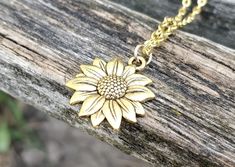 Sunflower Necklace. Choose Your Color. Gift For Wedding, Bridesmaids, Kids, Anniversary, Birthday, Christmas. by TreeTownPaper on Etsy Sunflower Design Flower Jewelry For Anniversary, Sunflower Design Jewelry For Anniversary, Mother's Day Sunflower Design Jewelry, Wedding Jewelry With Sunflower Design, Anniversary Gold Jewelry With Sunflower Design, Silver Sunflower Necklace For Mother's Day, Sunflower Jewelry For Anniversary And Mother's Day, Sunflower Design Jewelry For Mother's Day Anniversary, Sunflower Design Round Jewelry Gift