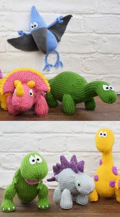 four knitted dinosaurs sitting in front of a brick wall, one with eyes closed