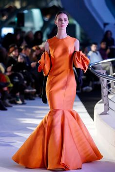 Description Orange Fitted through knees, Long dress Sleeveless Closed neckline Dry Clean Made in Spain SKU BOISSANO Isabel Sanchis, Orange Gown, High Neck Gown, Peplum Gown, Combination Dresses, Dress With Gloves, Orange Fits, Off Shoulder Gown, Trumpet Dress