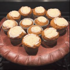 there are many cupcakes on the plate ready to be eaten in the oven