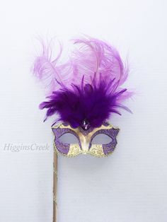 purple Mardi Gras Mask, purple Masquerade Ball, purple Handheld Stick Mask With the freedom to expose your true identity effortlessly, this fun and feminine masquerade mask on a stick is elegantly decorated with lace overlay & Rhinestones for a luxurious look. Perfect for any masquerade ball or costume party. Thank you for supporting small businesses and hope our products bring you and loved ones some joy and humor in these trying times. S H I P P I N G - Current processing times range 5-7 d Purple Masquerade Mask For Mardi Gras, Purple Masquerade Mask For Mardi Gras Carnival, Purple Masquerade Mask For Carnival, Purple Eye Mask For Costume Party, Purple Masquerade, Emoji Challenge, Metal Mask, Masked Ball, Masquerade Costumes