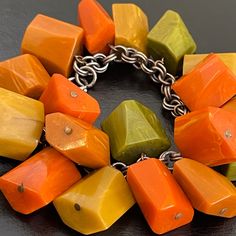 1940's Bakelite Chunky Charm Vintage Bracelet With 12k Gf Chain/Clasp Signed On The Clasp "1/20 12k G.F" Excellent Condition, No Flaws To Note Measures 7.5" In Length The Bakelite Charms Have Been Tested And Are True Bakelite See Pictures For Additional Details Charm Chain, Vintage Bracelet, Vintage Bracelets, Orange Yellow, Womens Jewelry Bracelets, Chain Bracelet, Bangles, Charms, Women Jewelry