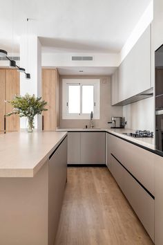 the kitchen is clean and ready for us to use in its new owner's home