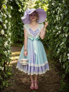 a woman in a dress and hat is posing for the camera