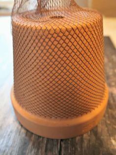 a brown cake sitting on top of a wooden table