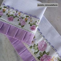 three pieces of fabric with flowers and polka dots on them, one is folded in half