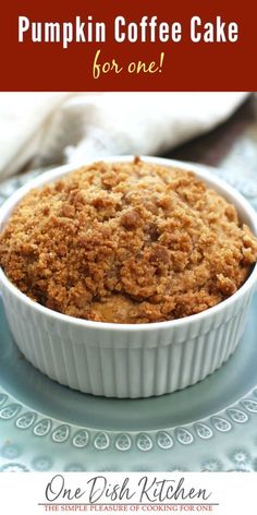 pumpkin coffee cake for one in a white dish on a blue plate with the title above it