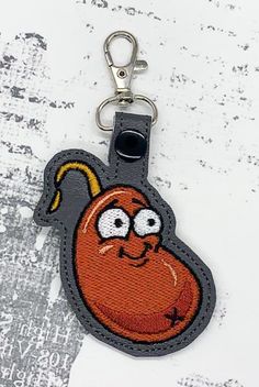 a key chain with a cartoon character on it