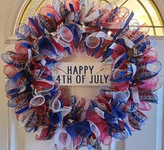 a wreath with the words happy 4th of july on it