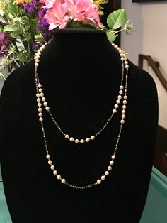 "This piece was designed to copy an actual necklace worn by Lady Mary in the PBS series Downton Abbey. This necklace is 50\" of glittering faceted gold natural iron pyrite beads interspersed with mint condition 6mm vintage cream faux Majorca pearls OR genuine AAA freshwater pearls (choose when you checkout). This is a VERY long necklace; it measures 50\" total from top to bottom. It can be worn as one long necklace (if you're tall or channeling your inner flapper) but it's also meant to be loope Elegant Beaded Double Strand Necklace, Elegant Beaded Chain Necklaces For Jewelry Making, Elegant Faceted Pearl Necklace, Elegant Long Necklace With Faceted Beads, Elegant Long Necklace With Faceted Round Beads, Elegant Handmade Chain Necklace With Round Beads, Antique Long Necklace For Formal Occasions, Classic Long Evening Necklace, Elegant Beaded Lariat Jewelry