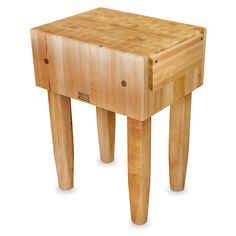 a small wooden table with two legs and a drawer on the top that has holes in it