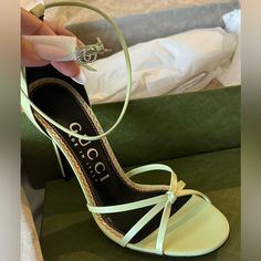 Style 748867 Aaa0p 1000 A Classic Silhouette, The Heeled Sandal Is Presented For The Latest Gucci Collection In Pistachio Green Leather. Minimal Silhouettes Enhance Elegant Looks, With A Sophisticated Touch. Heel Height 4.5” Green Dress Heels, Lv Heels, Lime Green Heels, Brothers Wedding, Gucci Collection, Strappy High Heels Sandals, Gucci Heels, Emerald Green Dresses, Light Green Color