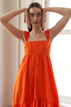 A solid woven midi dress featuring straight neckline, gathered strap, ruffle hemline, hi-lo and back zipper closure Details: Self : 79% Polyester 17% Rayon 4% Spandex Size & Fit - Model is 5`9" And Wearing Size Small- Measurements Taken From Size Small- Approx. Length: 46" Orange Ruffled Midi Sundress, Ruffled Strap Dresses For Brunch, Chic Orange Sundress With Ruffles, Summer Midi Dress With Ruffles And Square Neck, Summer Dresses With Ruffle Hem And Straight Neckline, Solid Summer Midi Dress With Ruffles, Day Out Dresses With Ruffles And Straight Neckline, Ruffled Dresses With Straight Neckline For Day Out, Straight Neckline Dress With Ruffles For Day Out