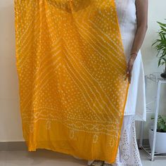 Silk Dimensions Width: 44 Inches; Length: 2.25 Metres Description Handmade Item WELCOME TO TieDyeDupatta Color :- Yellow Size:- Length : 2.5 Meters Width : 44 Inches Material: Thread, Silk  ETHNICITY CHUNRI SCARVES DUPATTA  1 PCS SOLID COLOR Dupatta, Rajasthani Bandhej Dupatta tapara Silk Bandhani Bandhej Women Heavy Dupatta Beautiful silk Indian dupatta with a hand dyed traditional chunri design. This solid tie-and-dye scarf has a very soft and light weight fabric. Lightweight scarf womens scar Bohemian Chanderi Choli For Wedding, Semi-stitched Bandhani Anarkali Set For Wedding, Chanderi Bandhani Print Anarkali Set For Wedding, Bohemian Sharara With Motifs For Wedding, Bohemian Anarkali Set For Wedding With Cutdana, Bohemian Cutdana Anarkali Set For Wedding, Wedding Semi-stitched Anarkali Set With Bandhani Print, Bohemian Wedding Sharara With Motifs, Wedding Lehenga With Bandhani Print For Transitional Season