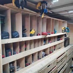 the shelves are filled with tools and construction equipment