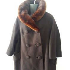 Vintage 1950s Seymour Fox Double-Breasted Plus-Size Dress Coat With Fur Collar. Woven In France By Felix Vercel Exclusively For Seymour Fox. A Stunning Ladies Overcoat, This Merino Wool Classic Has A Ribbed Chocolate Brown Outer Shell, Two Deep Side Pockets, Two-Tone Satin Lining And Six Front Buttons. Not Labelled With A Size. Believed To Be A 20-22 W Based On Measurements. Measures 18.5" Shoulder To Shoulder; 26" Pit To Pit; 28" Hip To Hip; 17" Sleeve; 42" From Collar To Bottom Hem. Good Vinta Ladies Overcoat, Coat With Fur Collar, Coat With Fur, France Colors, Women Overcoat, Dress Coat, Fur Collar, Fur Collars, Coat Dress