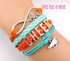 two bracelets with the words love and cheer on them, one has an orange ribbon