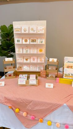 the table is set up with cards and boxes on it