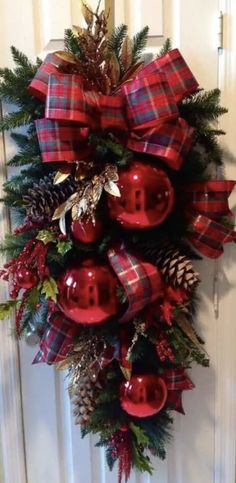 a christmas wreath with red and green ornaments