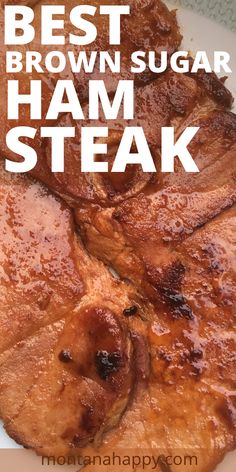 the best brown sugar ham steak is on a white plate with text overlay that reads, best brown sugar ham steak