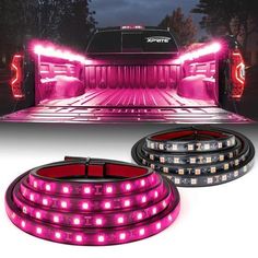 the back end of a truck with pink lights