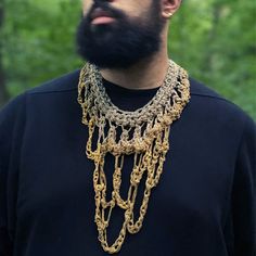 Hundreds of feet of 22k gold-plated stainless steel ballchain hand crocheted into an asymmetrical, dripping neckpiece. Heavy weight like a gravity blanket of armor. Dimensions: Length: 18" around the neck with a 12" drop from the front Composition: Stainless steel 22k gold plated ballchain (chain sourced from Mount Vernon, NY) Gold Macrame Brass Necklaces, Gold Brass Macrame Necklace, Gravity Blanket, Sea Change, Mount Vernon, 22k Gold, Hand Crochet, Heavy Weight, Gravity