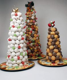 three different types of candy trees on plates