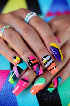 Colorful stiletto nails with bold geometric designs against a vibrant patterned background. Summer Nail Inspiration, Winter Nail Art Designs, Cute Nail Art Designs, Nail Idea, Long Acrylic, Winter Nail Art